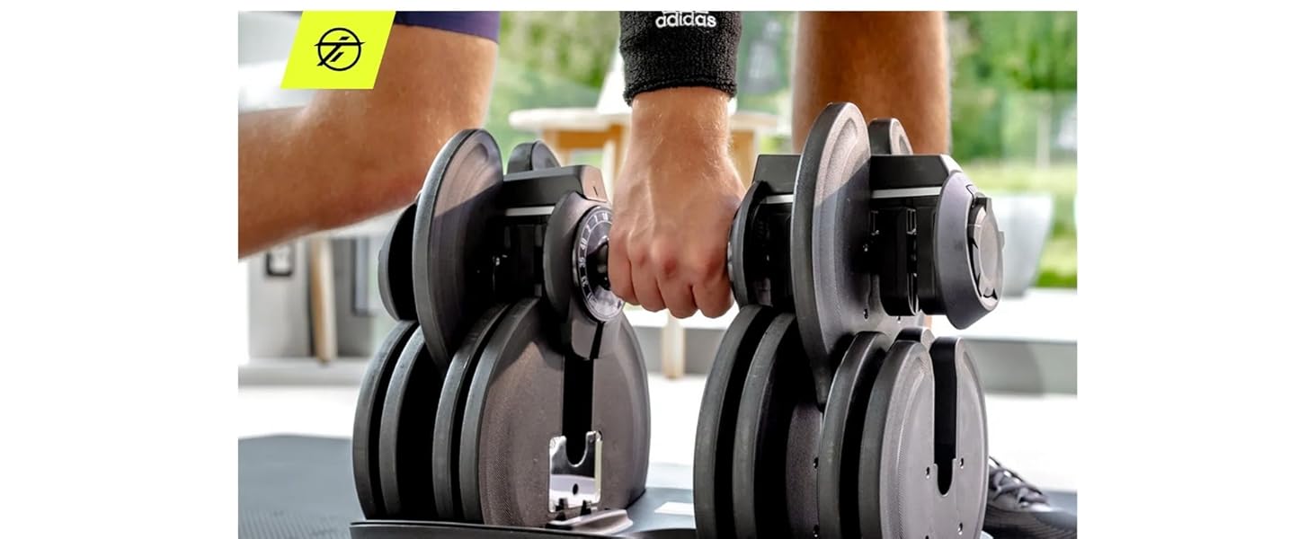 Регульована гантель TREXO 18-40 кг з поворотним регулятором ваги. Залізна гантель для силових тренувань з ергономічною ручкою.