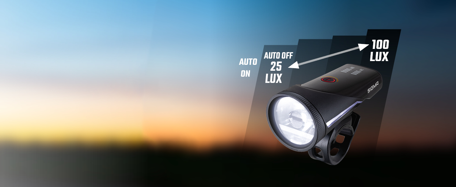 Комплект велофар SIGMA Aura 100/Blaze Link з силіконовим кріпленням, LED передня фара 100 Люкс, заднє світло з функцією стоп-сигналу, автоматичне регулювання яскравості