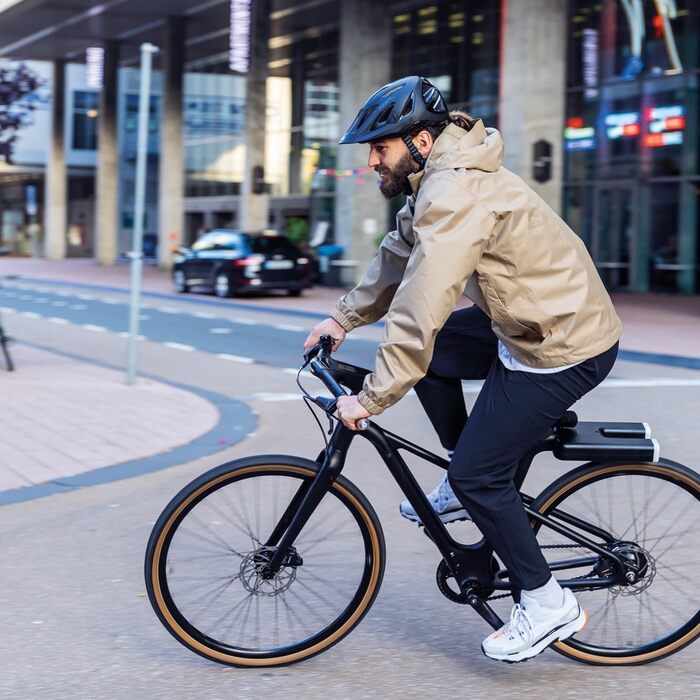Велошолом ABUS Urban-I 3.0 з ліхтарем, козирком і магнітною застібкою для жінок і чоловіків